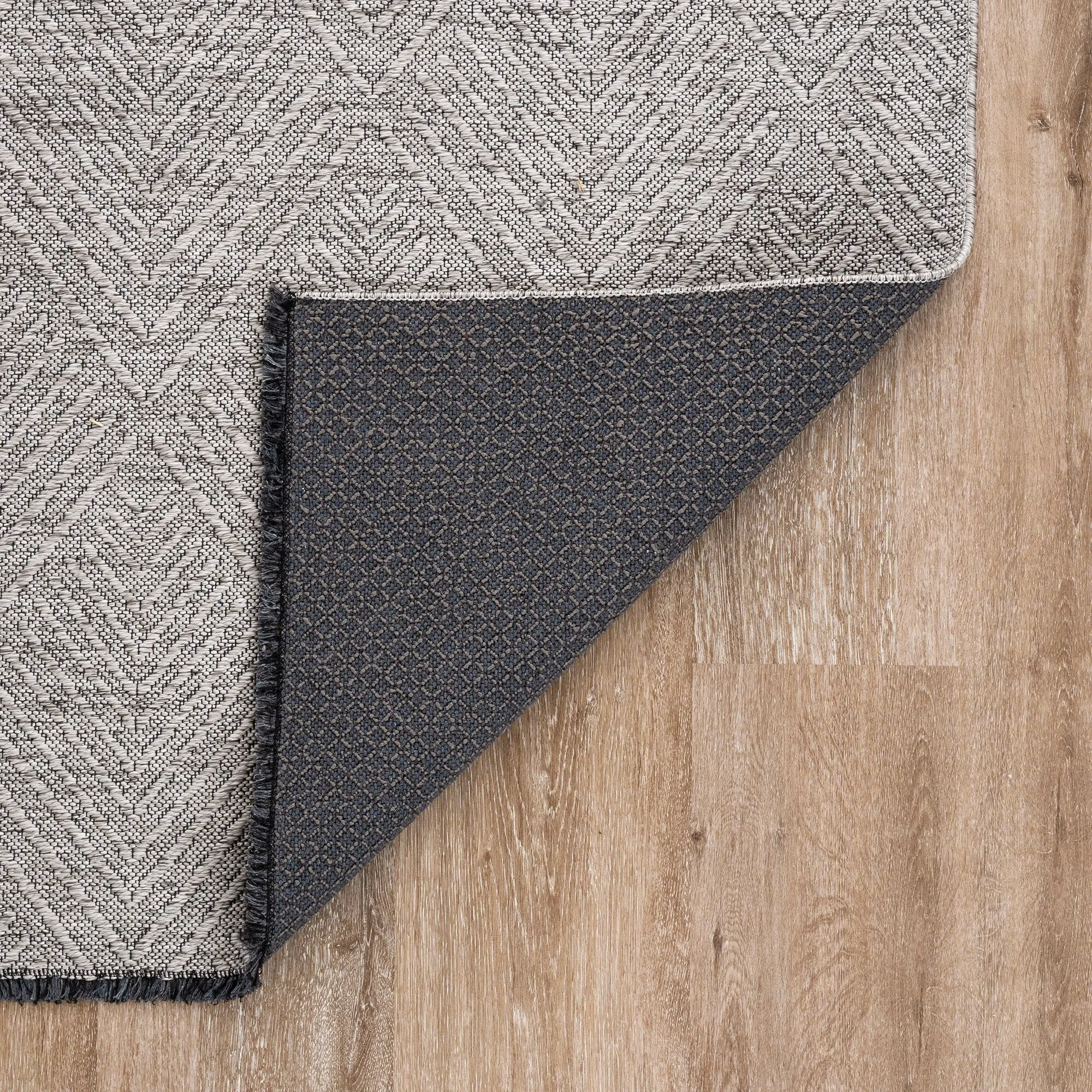 Alameda Solid Color Chevron Machine Washable Indoor Area Rug