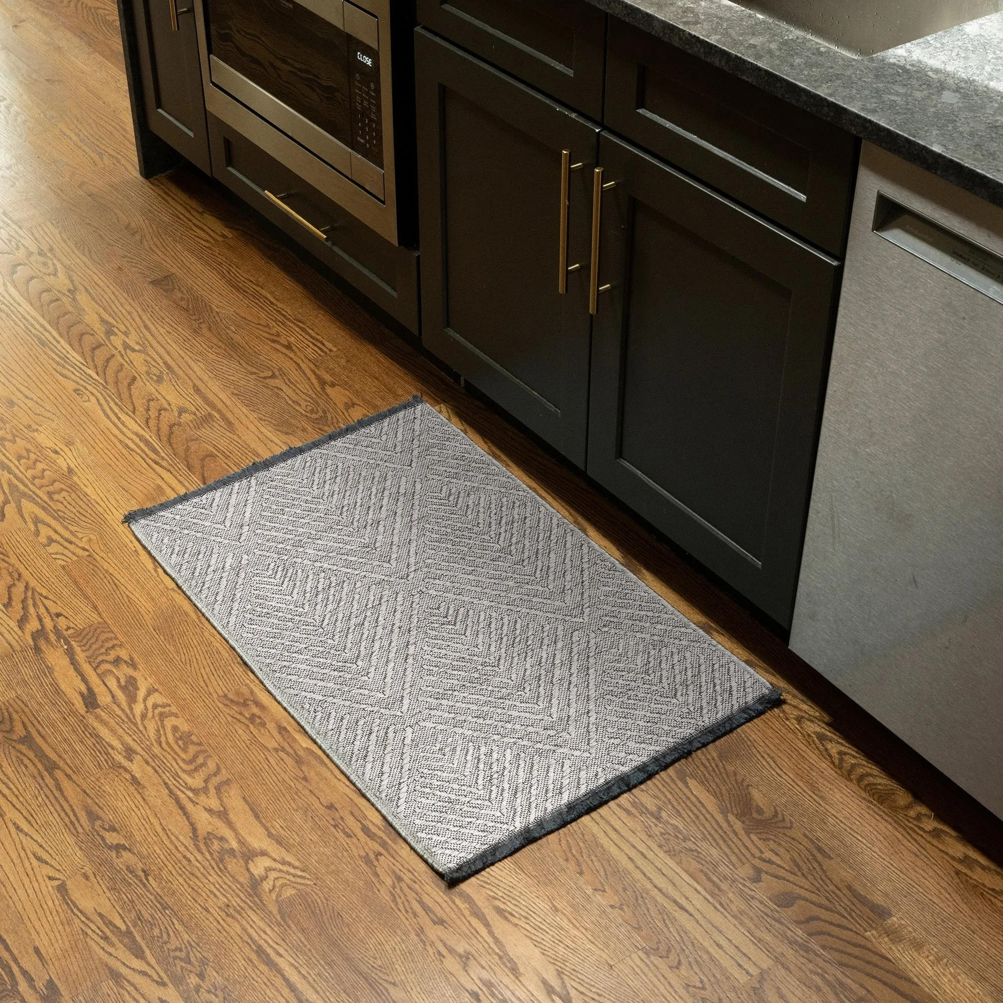 Alameda Solid Color Chevron Machine Washable Indoor Area Rug