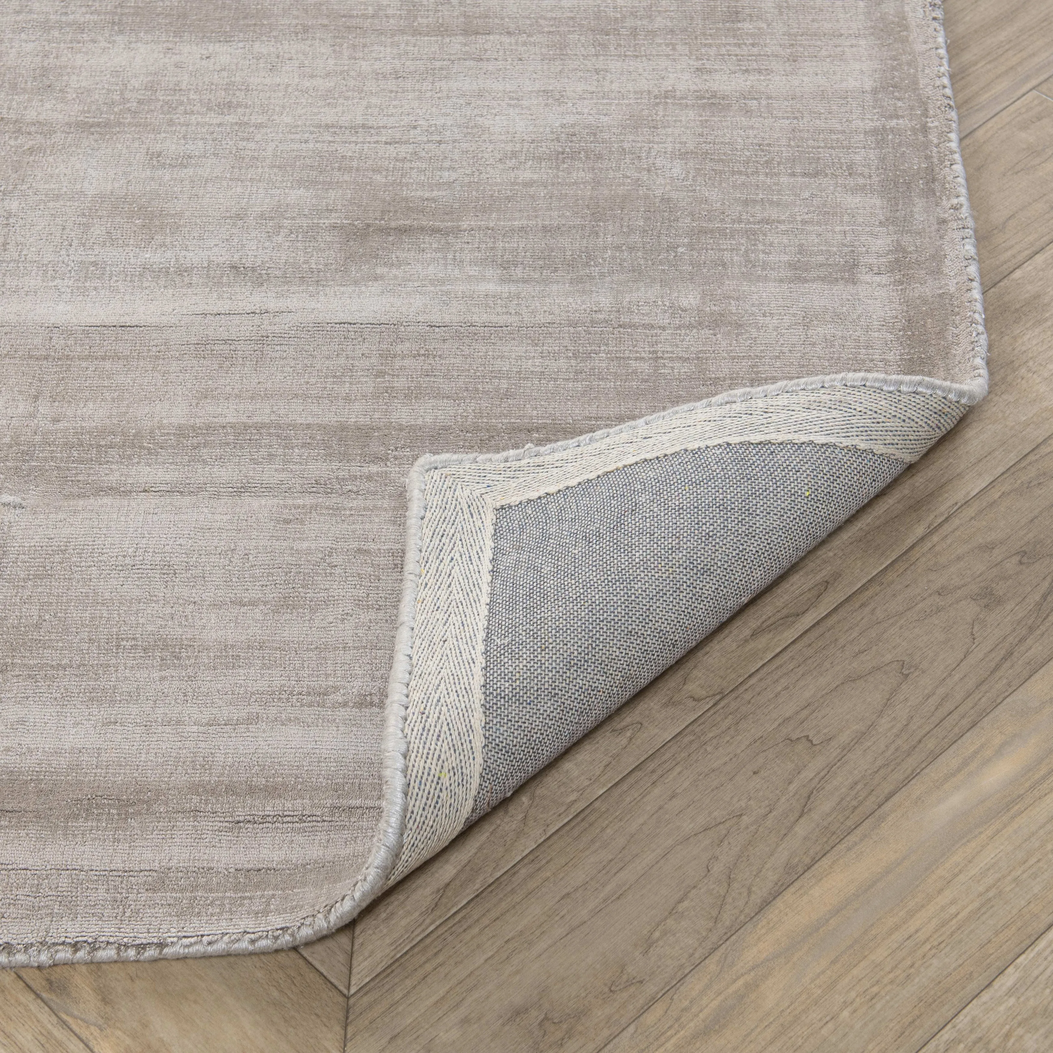 Cameron Handwoven Distressed Viscose Area Rug by Kosas Home