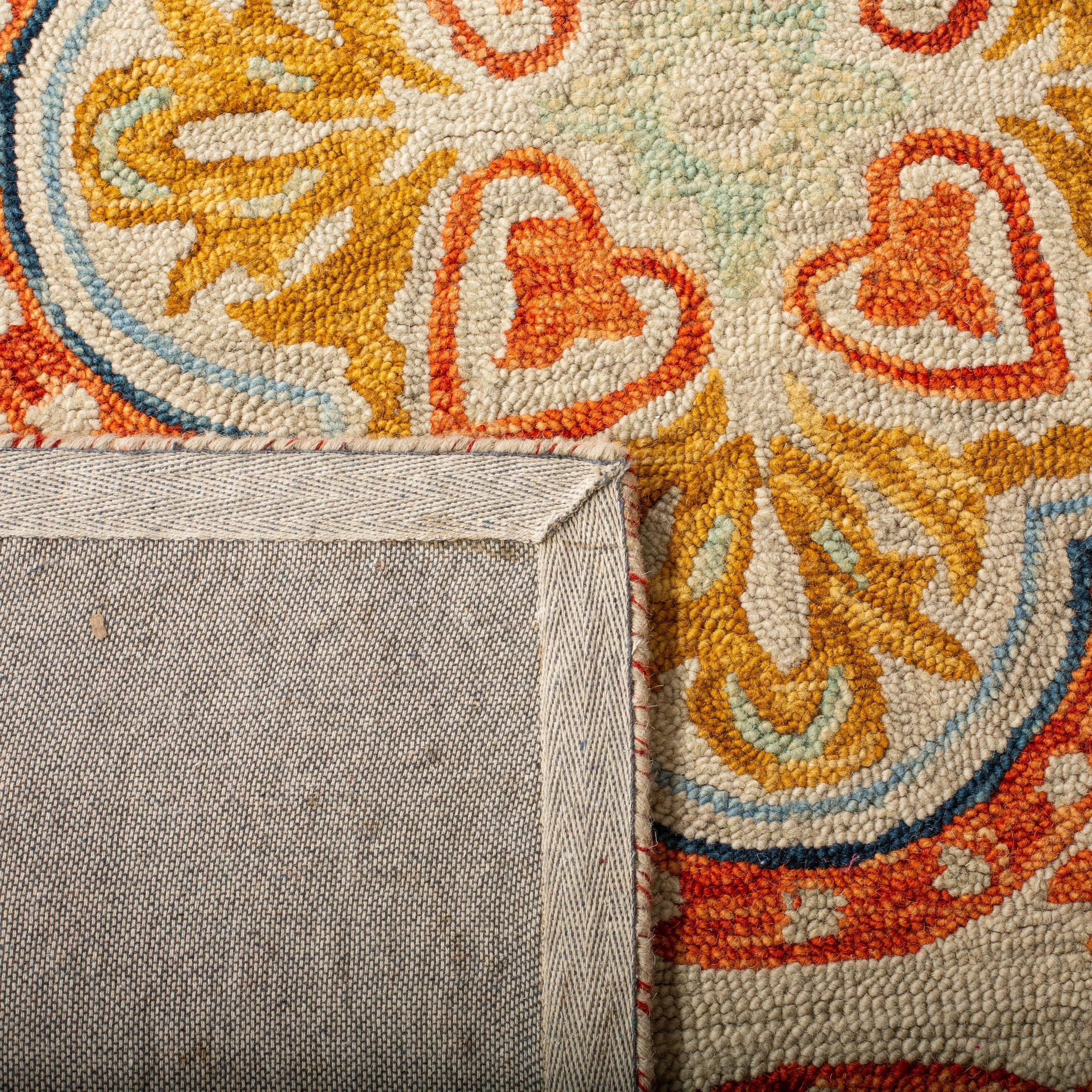 SAFAVIEH Handmade Aspen Misao Boho Tassel Wool Rug