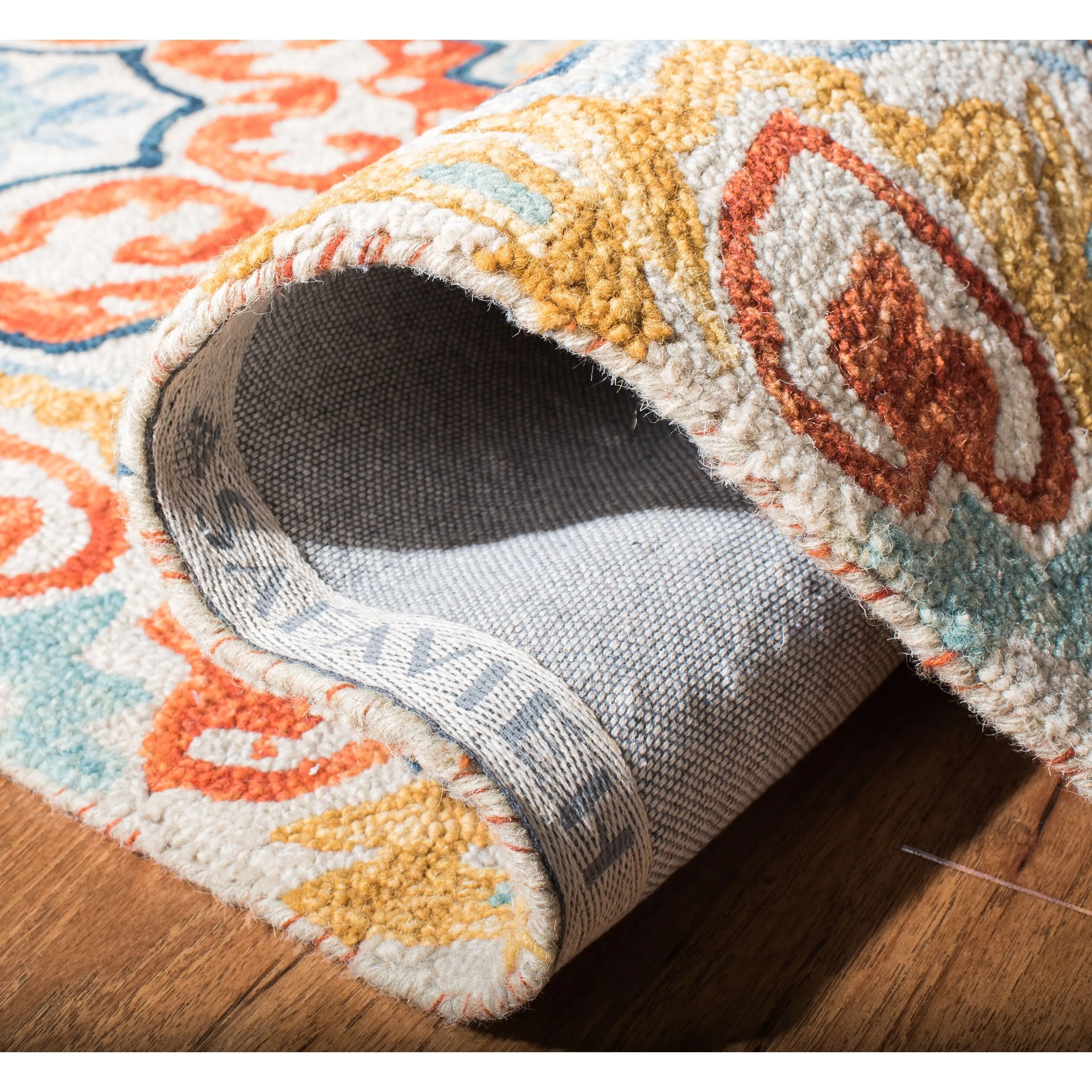 SAFAVIEH Handmade Aspen Misao Boho Tassel Wool Rug