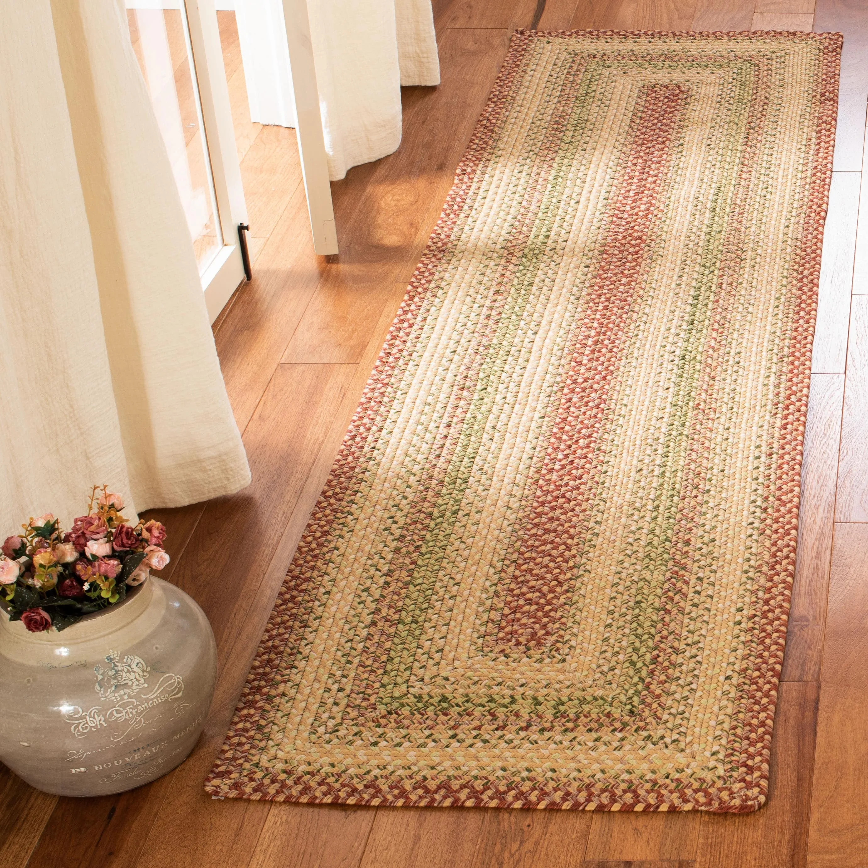 SAFAVIEH. Handmade Braided Adelajde Country Rug