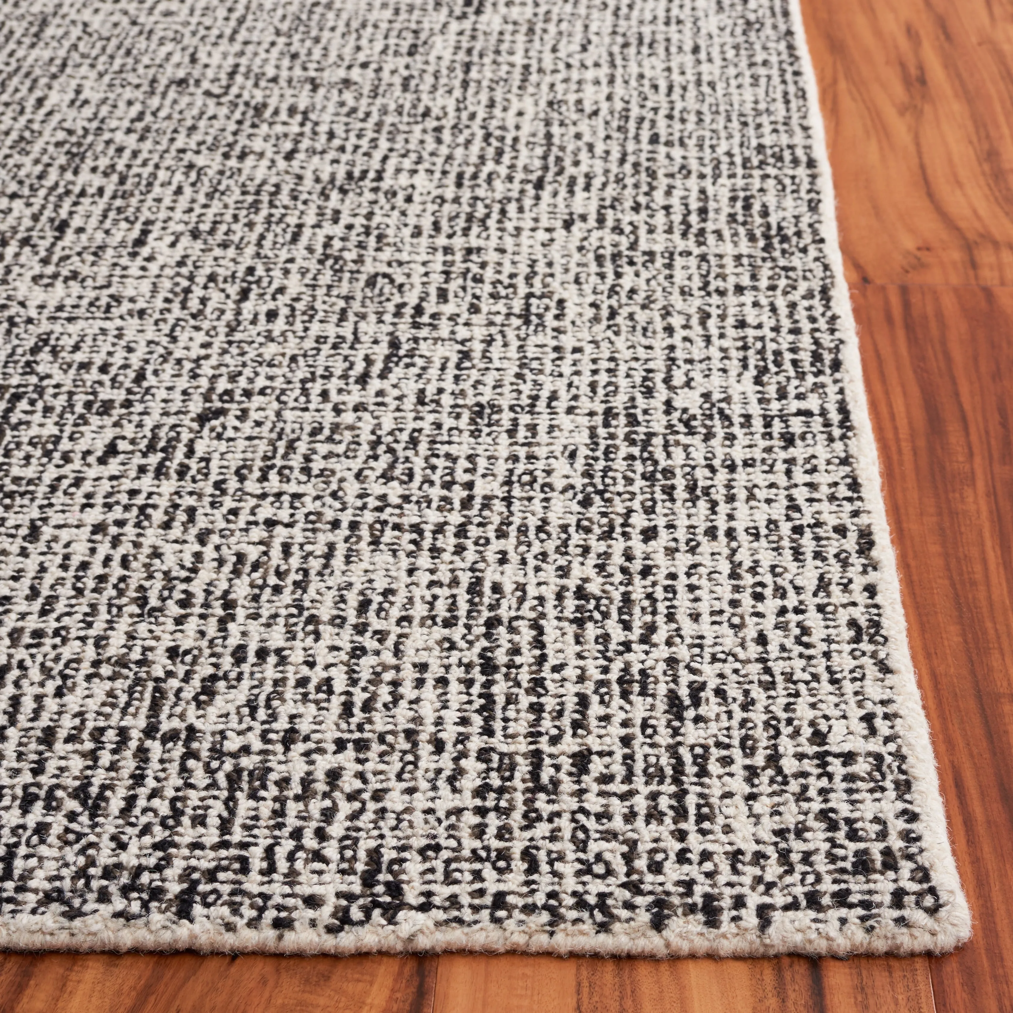 SAFAVIEH Handmade Ebony Gulderen Modern Wool Rug