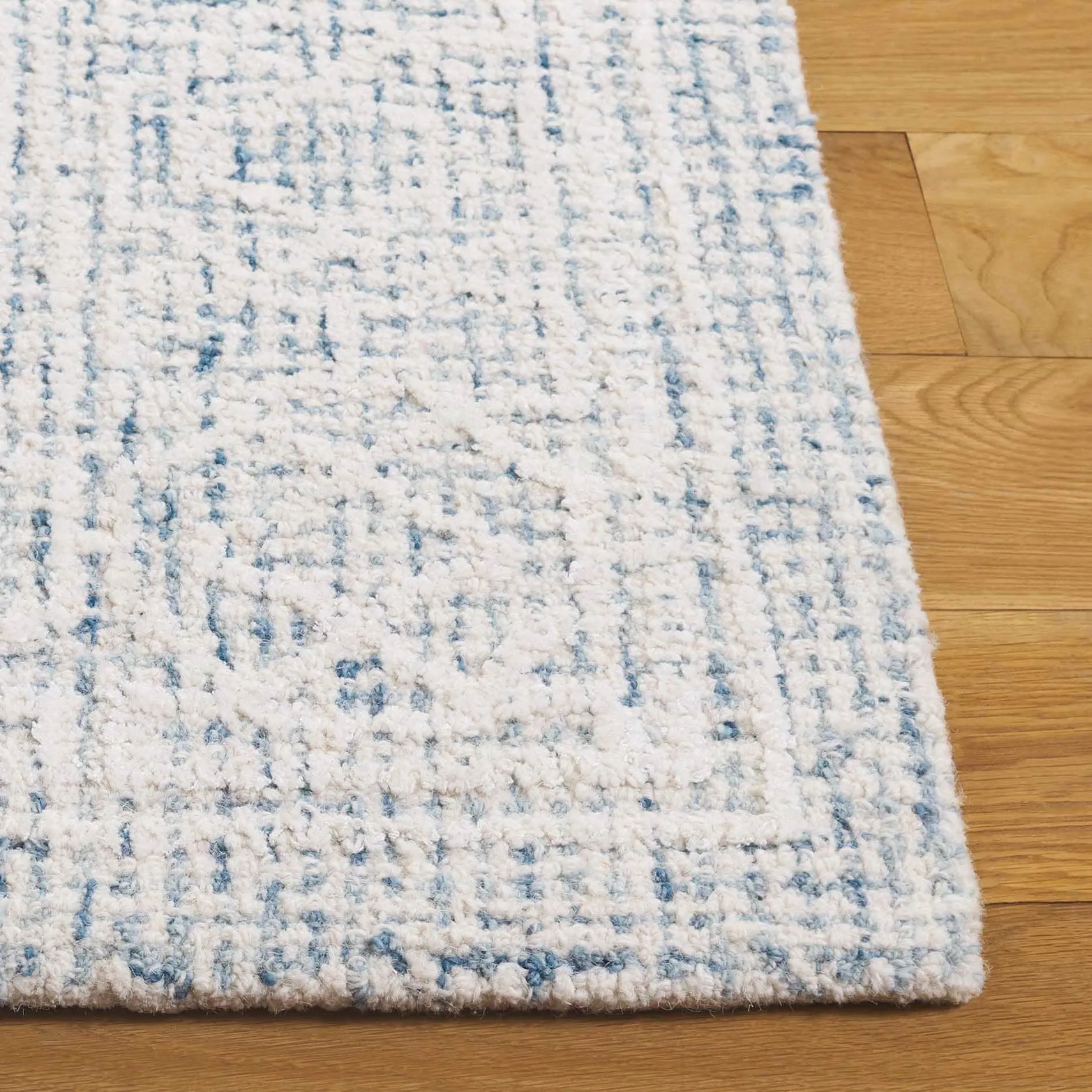 SAFAVIEH Handmade Ebony Lutien Wool Rug