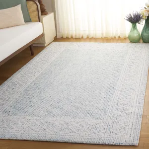 SAFAVIEH Handmade Ebony Lutien Wool Rug