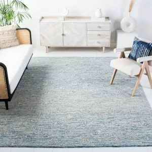 SAFAVIEH Handmade Micro-Loop Gatienne Modern Wool Rug