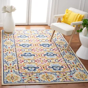 SAFAVIEH Handmade Micro-Loop Sinela Wool Rug