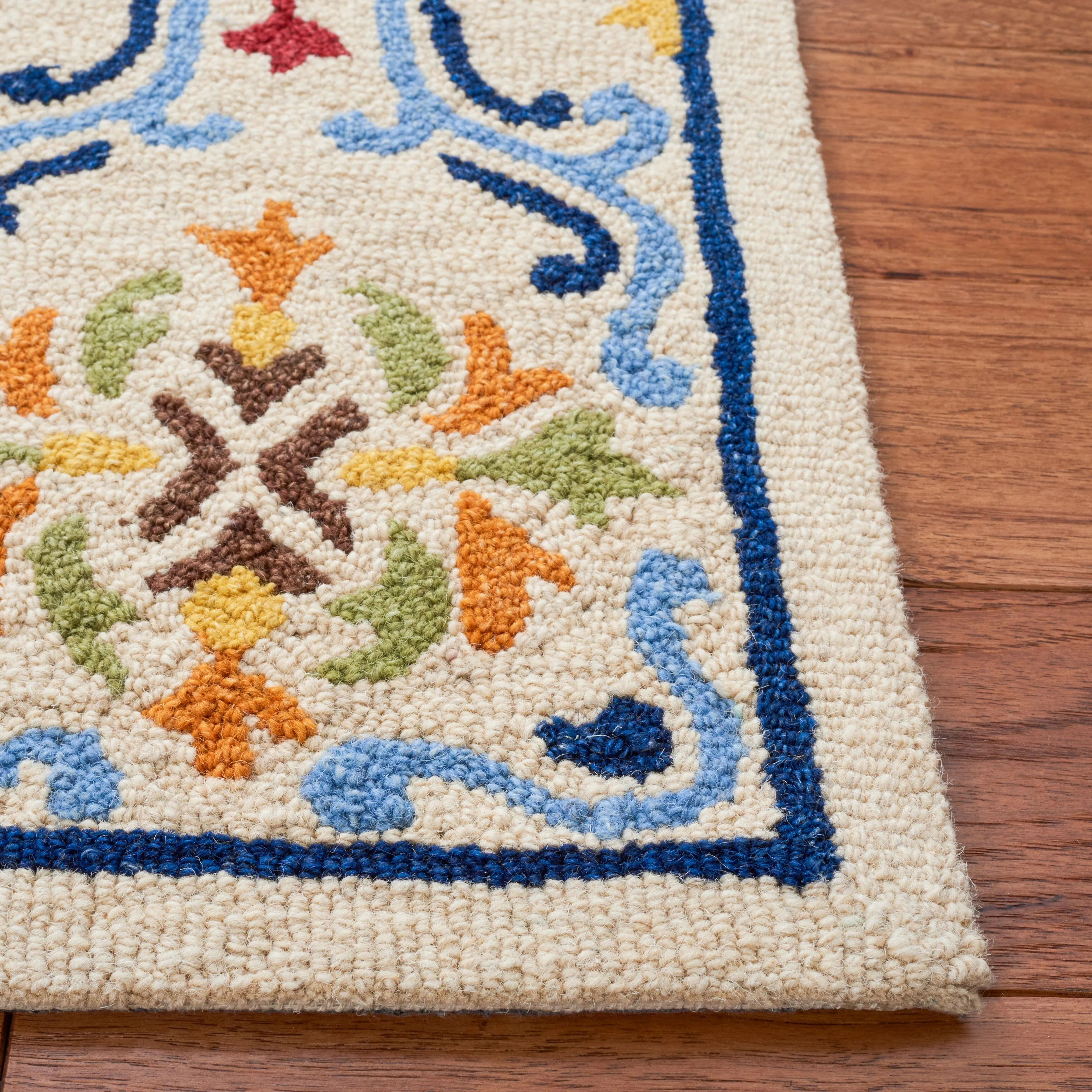 SAFAVIEH Handmade Micro-Loop Sinela Wool Rug