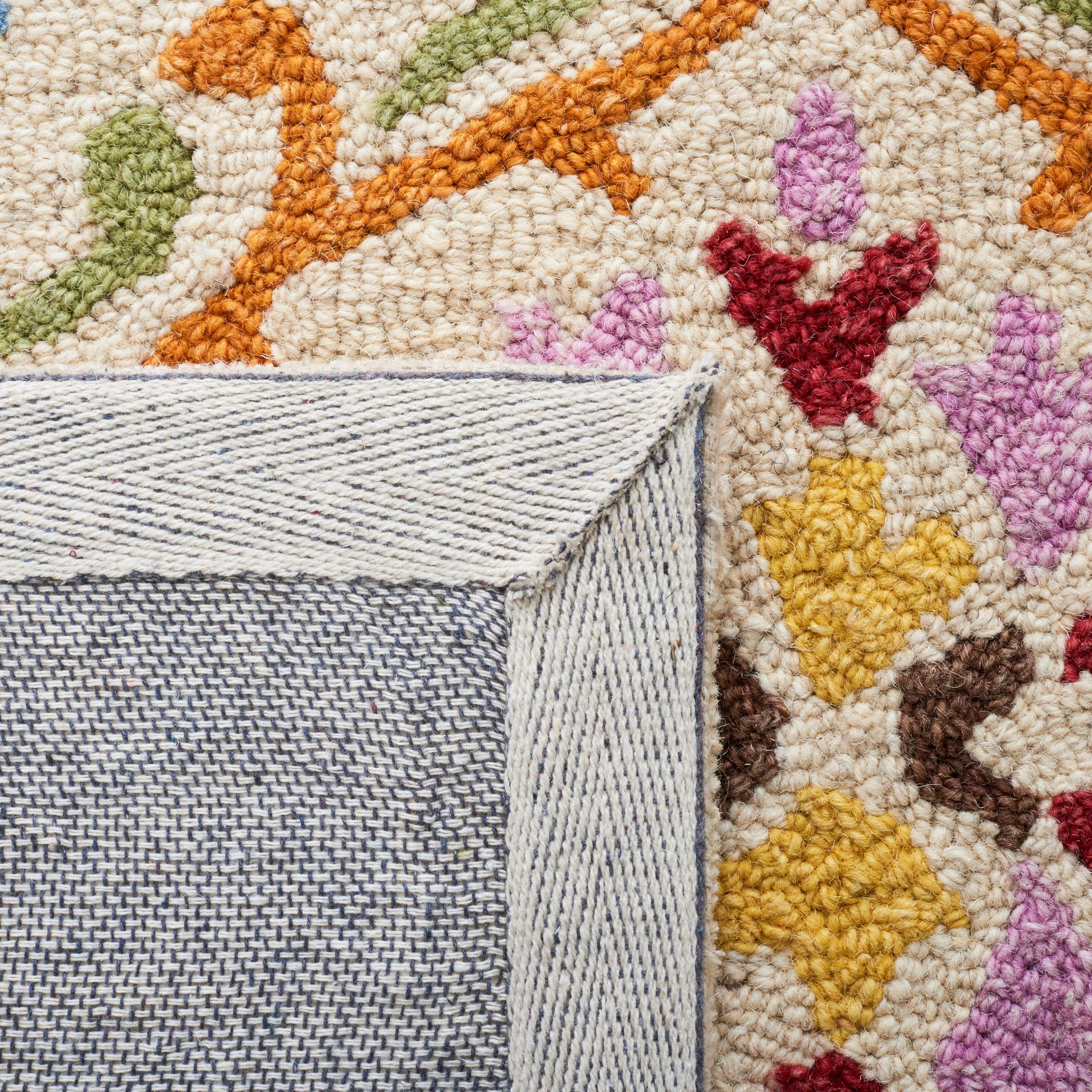 SAFAVIEH Handmade Micro-Loop Sinela Wool Rug