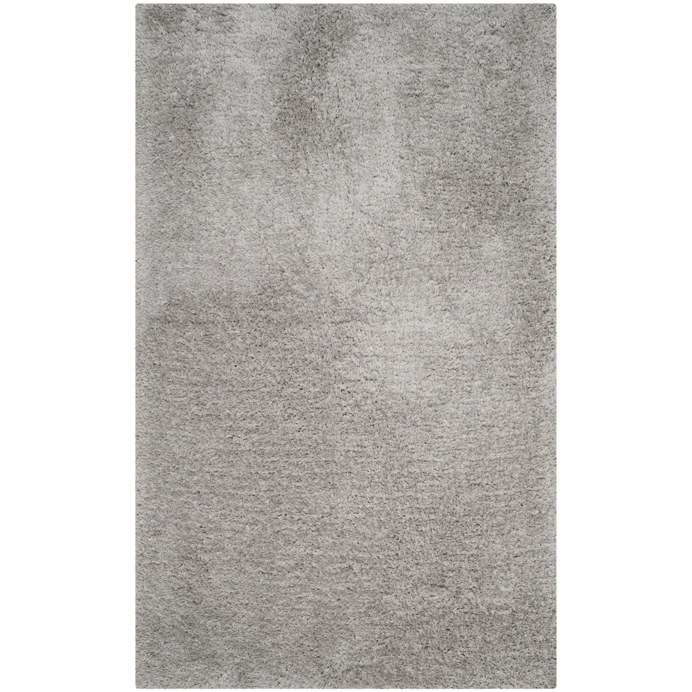 SAFAVIEH Handmade Ryann Shag Anneclaar Solid Polyester Rug
