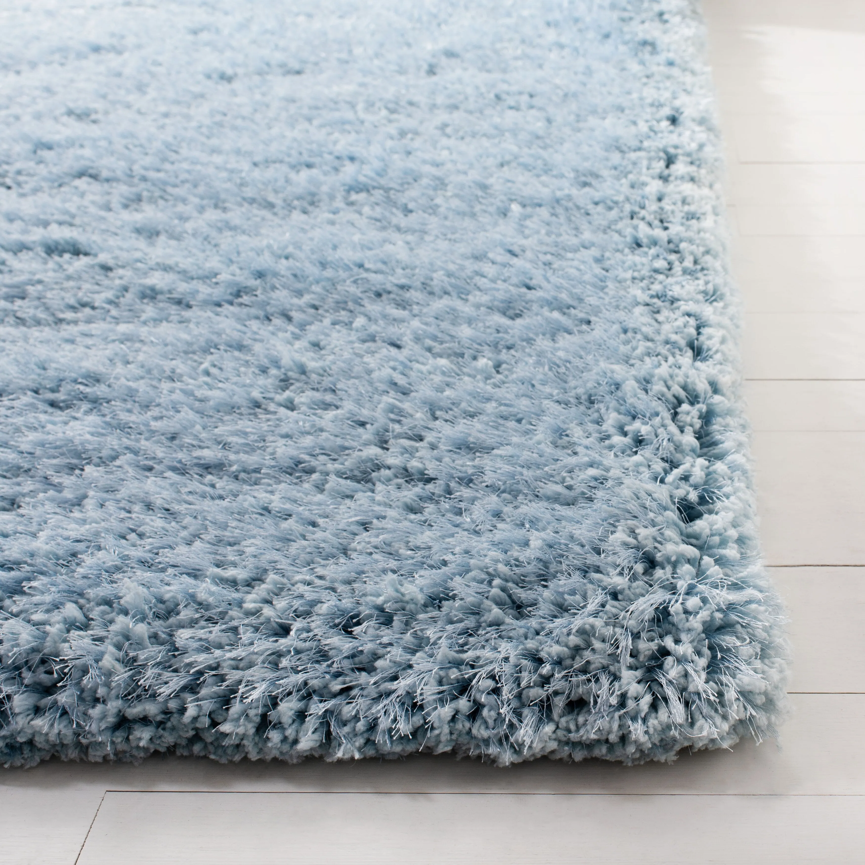 SAFAVIEH Handmade Ryann Shag Anneclaar Solid Polyester Rug