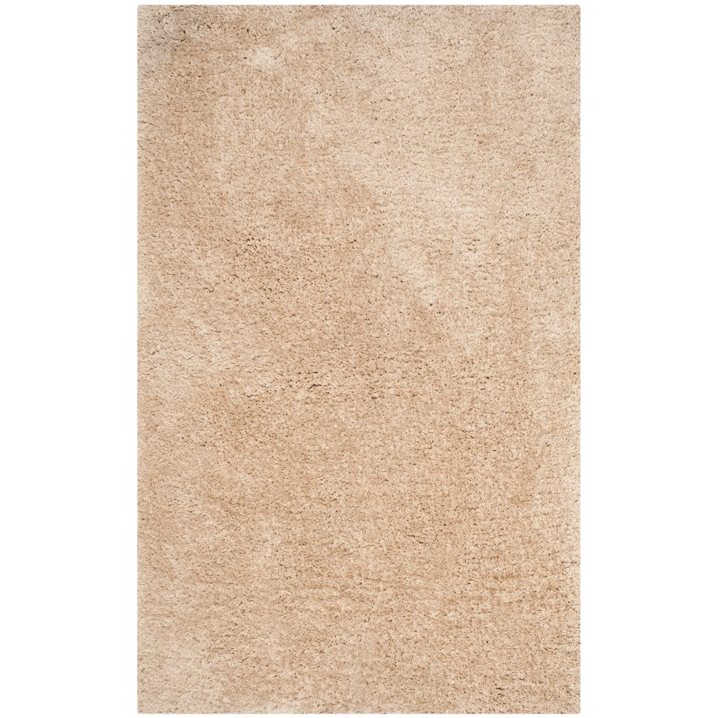 SAFAVIEH Handmade Ryann Shag Anneclaar Solid Polyester Rug