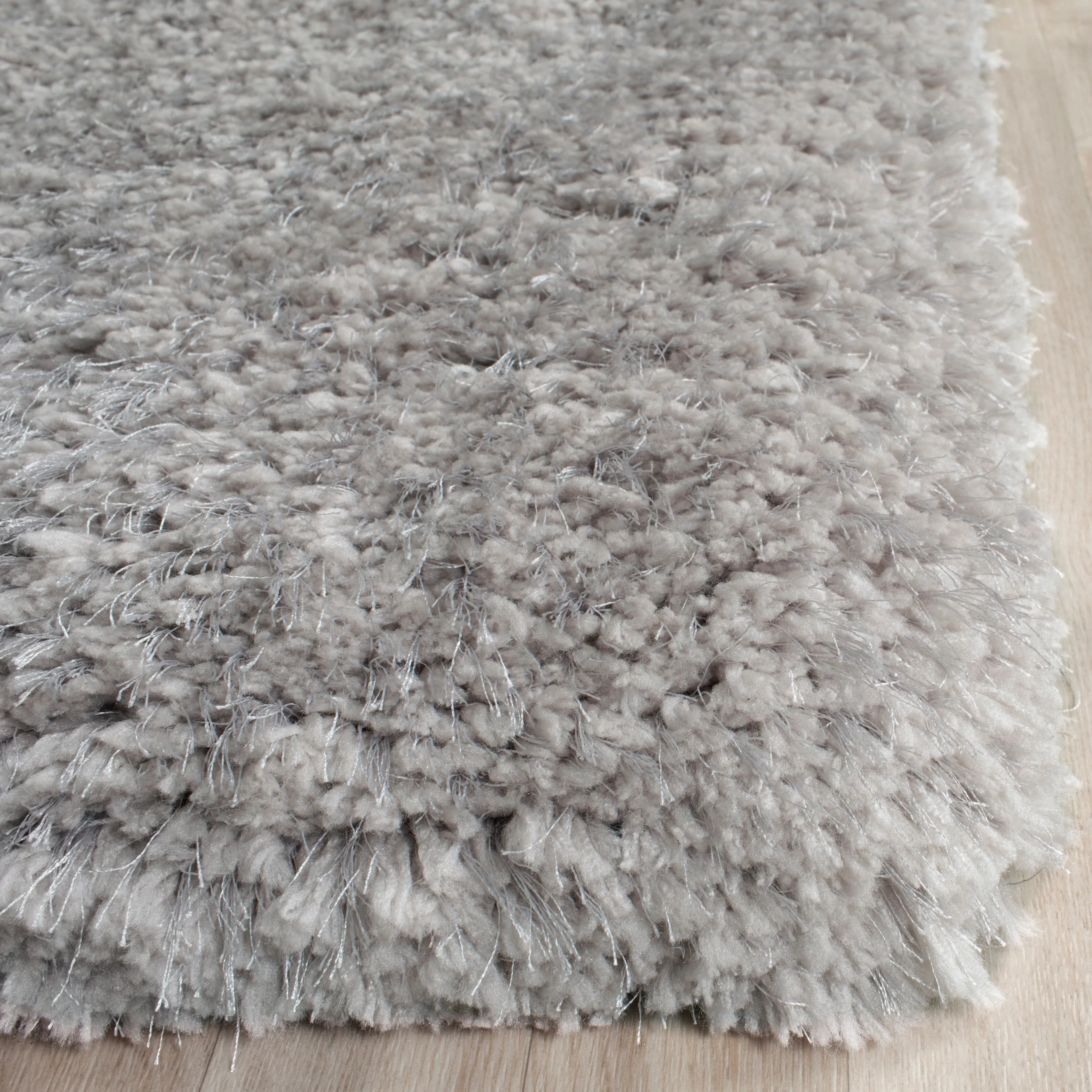 SAFAVIEH Handmade Ryann Shag Anneclaar Solid Polyester Rug