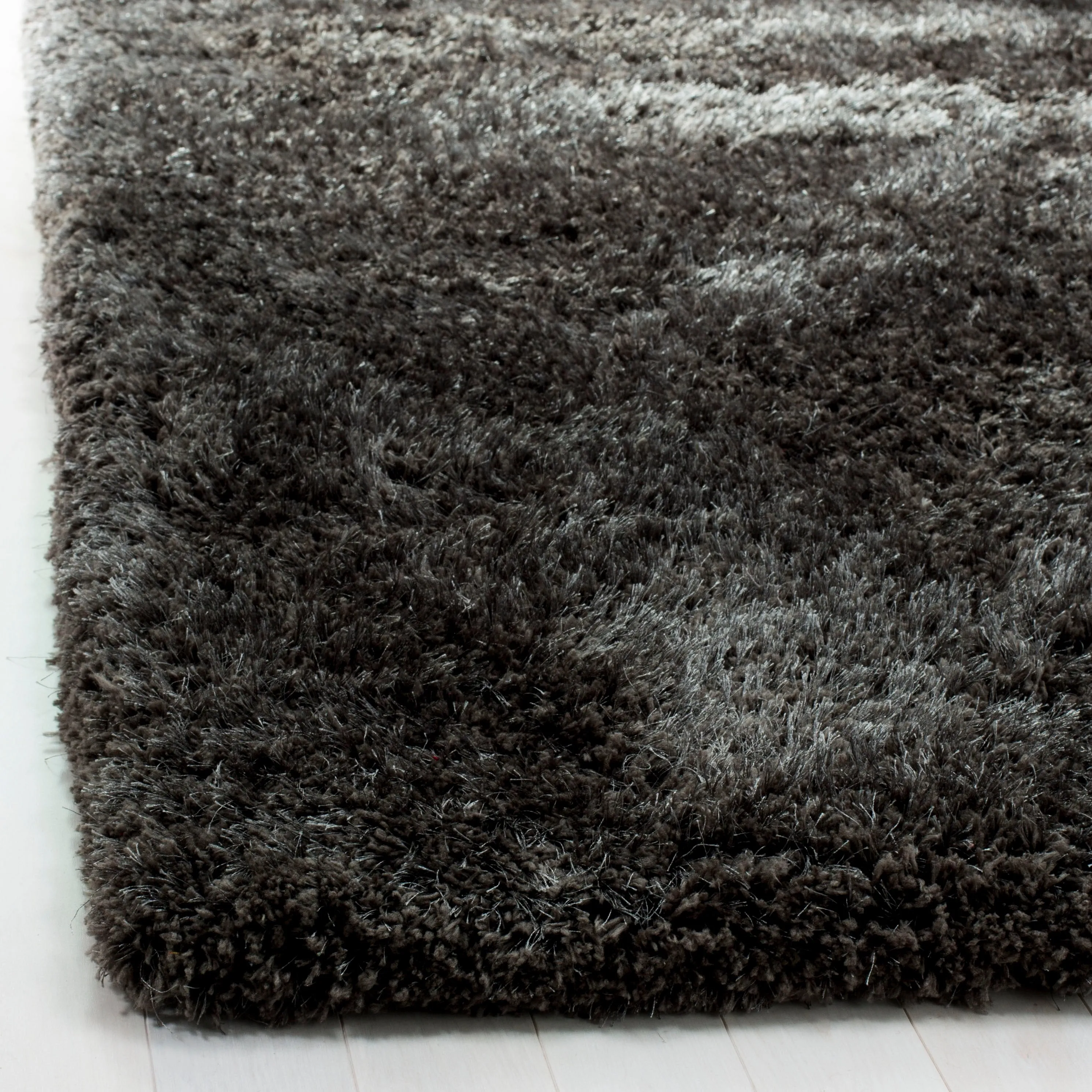 SAFAVIEH Handmade Ryann Shag Anneclaar Solid Polyester Rug