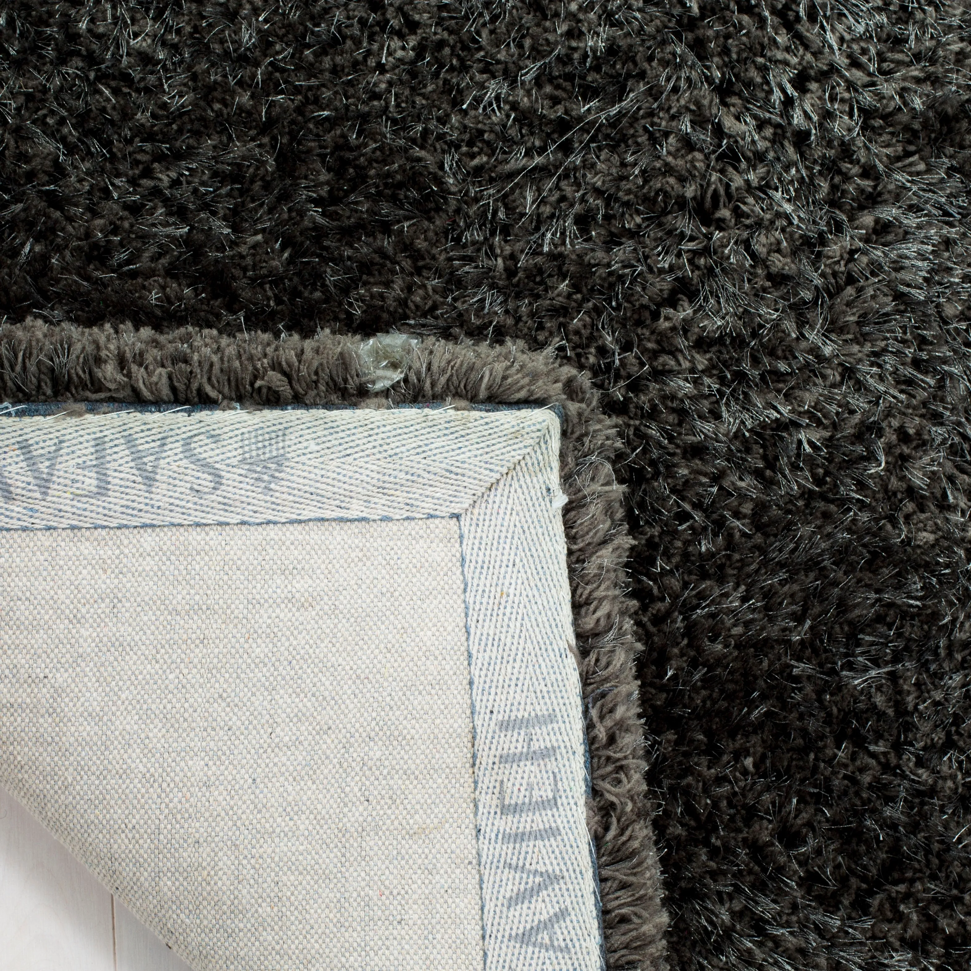 SAFAVIEH Handmade Ryann Shag Anneclaar Solid Polyester Rug