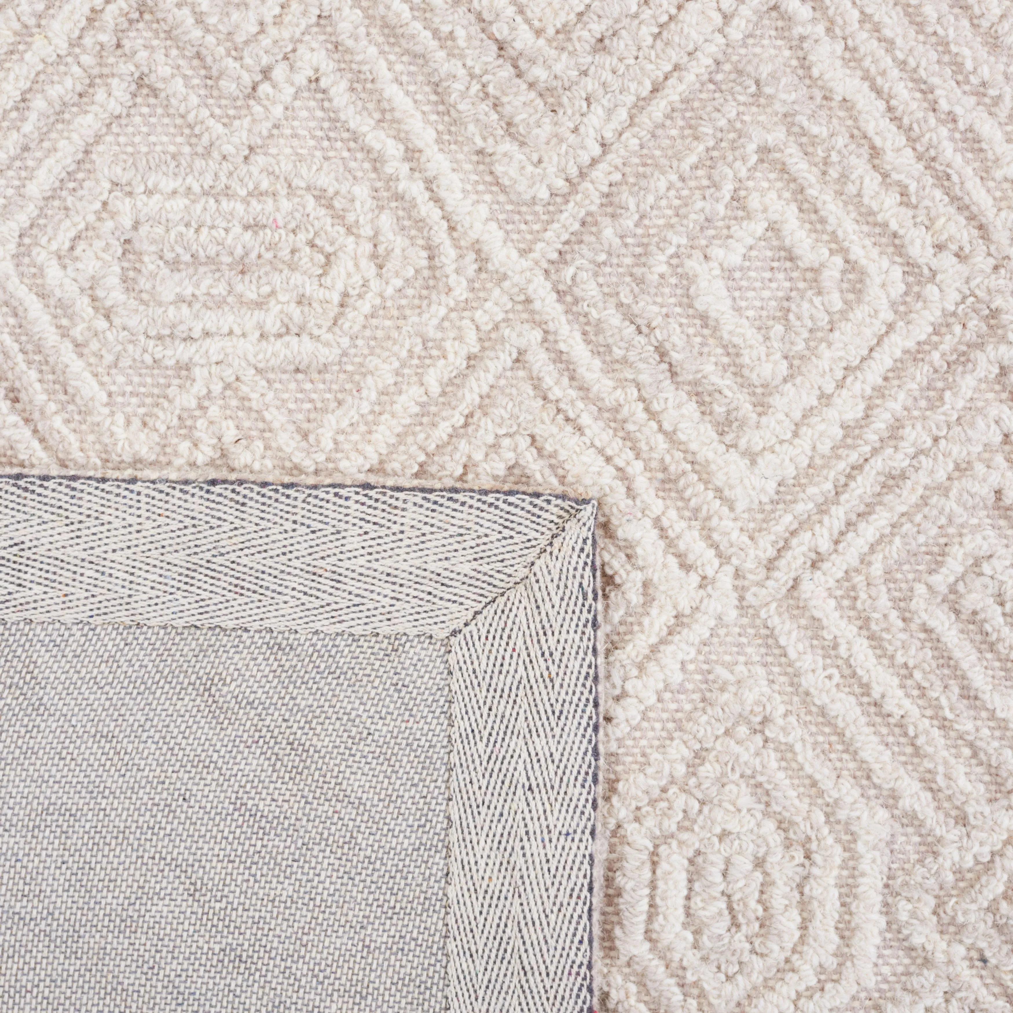 SAFAVIEH Handmade Textual Vibha Wool Rug