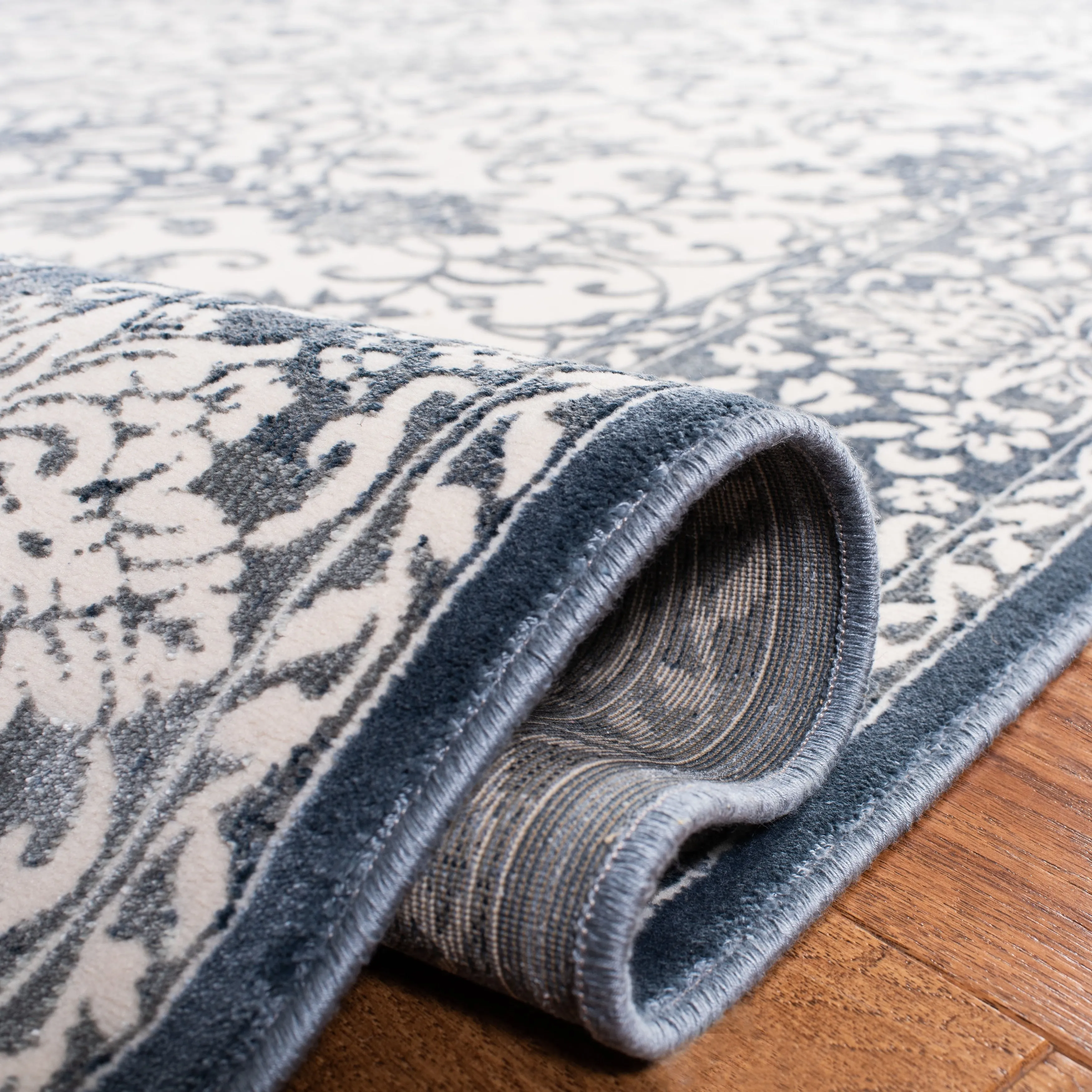 SAFAVIEH Noble Octavie Modern Oriental Polyester Rug