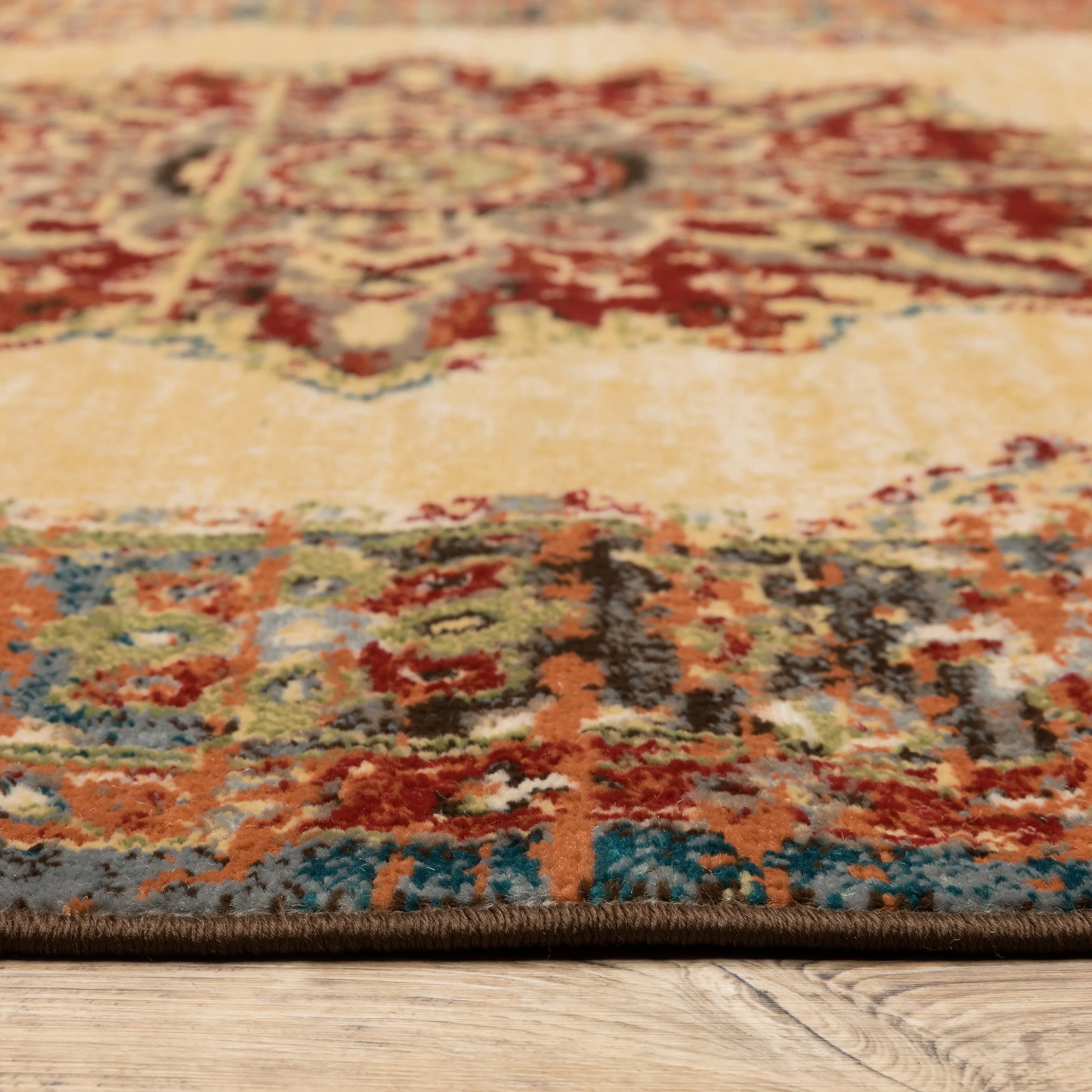 Vista Home Assen Goldtone/Orange Starburst Medallion Area Rug
