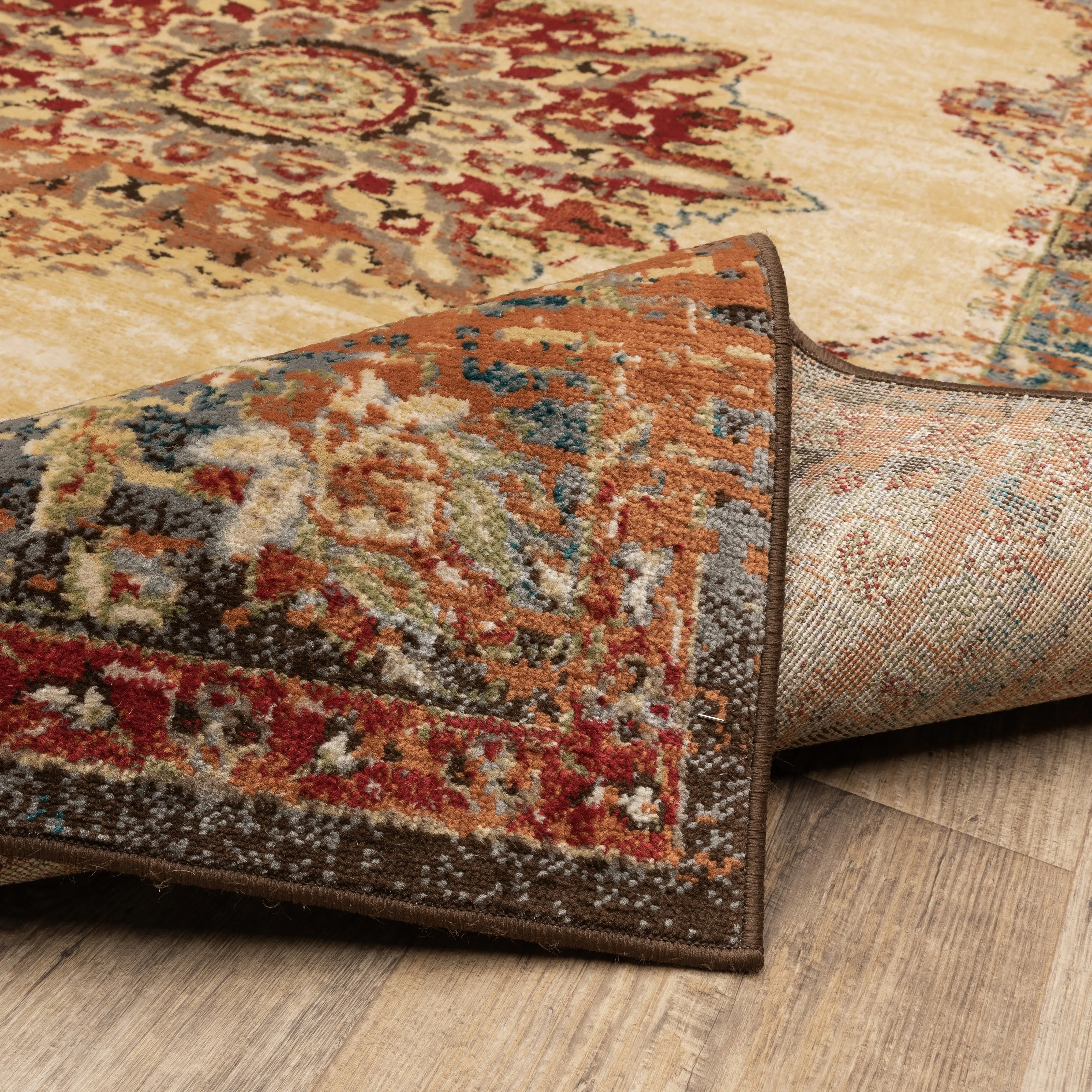 Vista Home Assen Goldtone/Orange Starburst Medallion Area Rug
