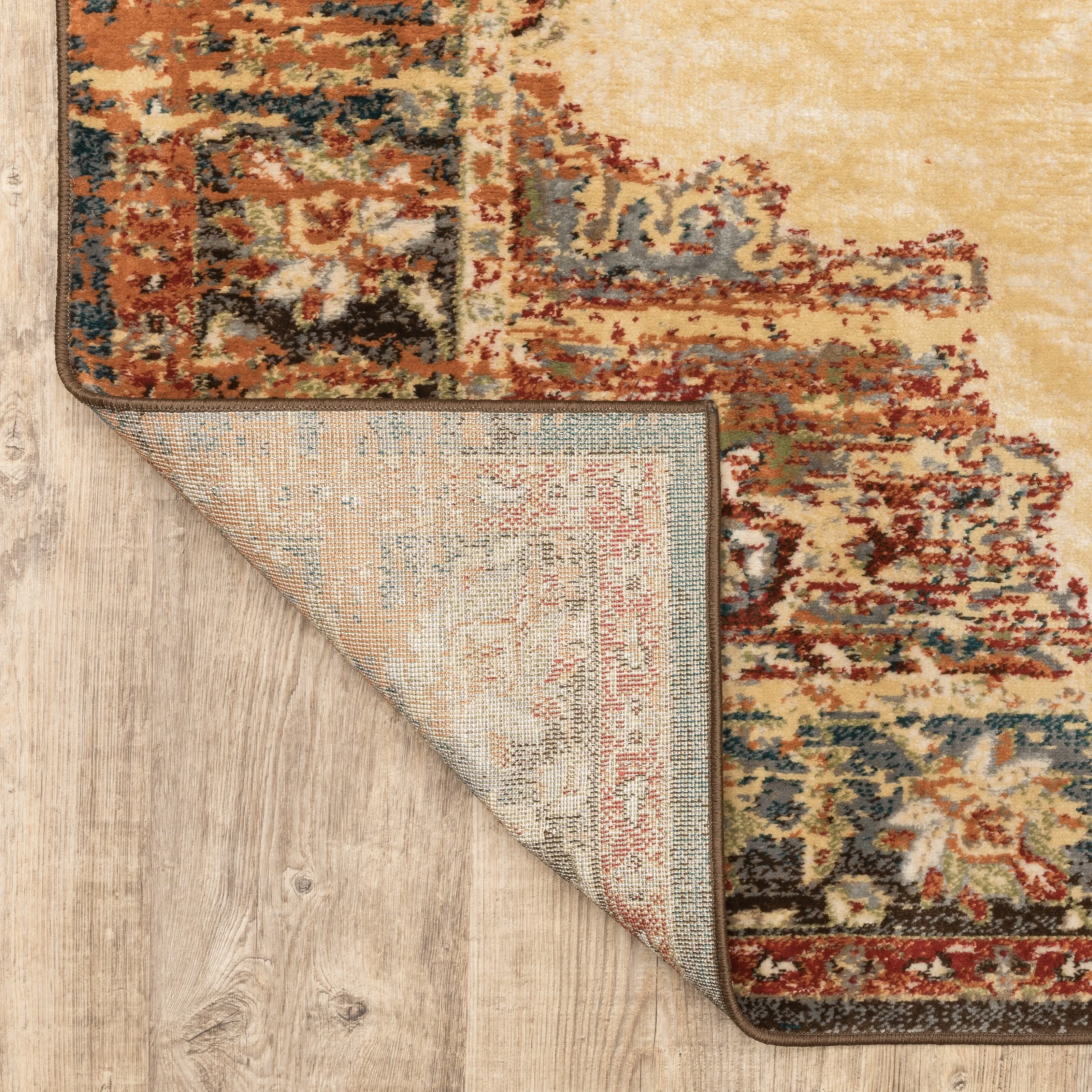 Vista Home Assen Goldtone/Orange Starburst Medallion Area Rug