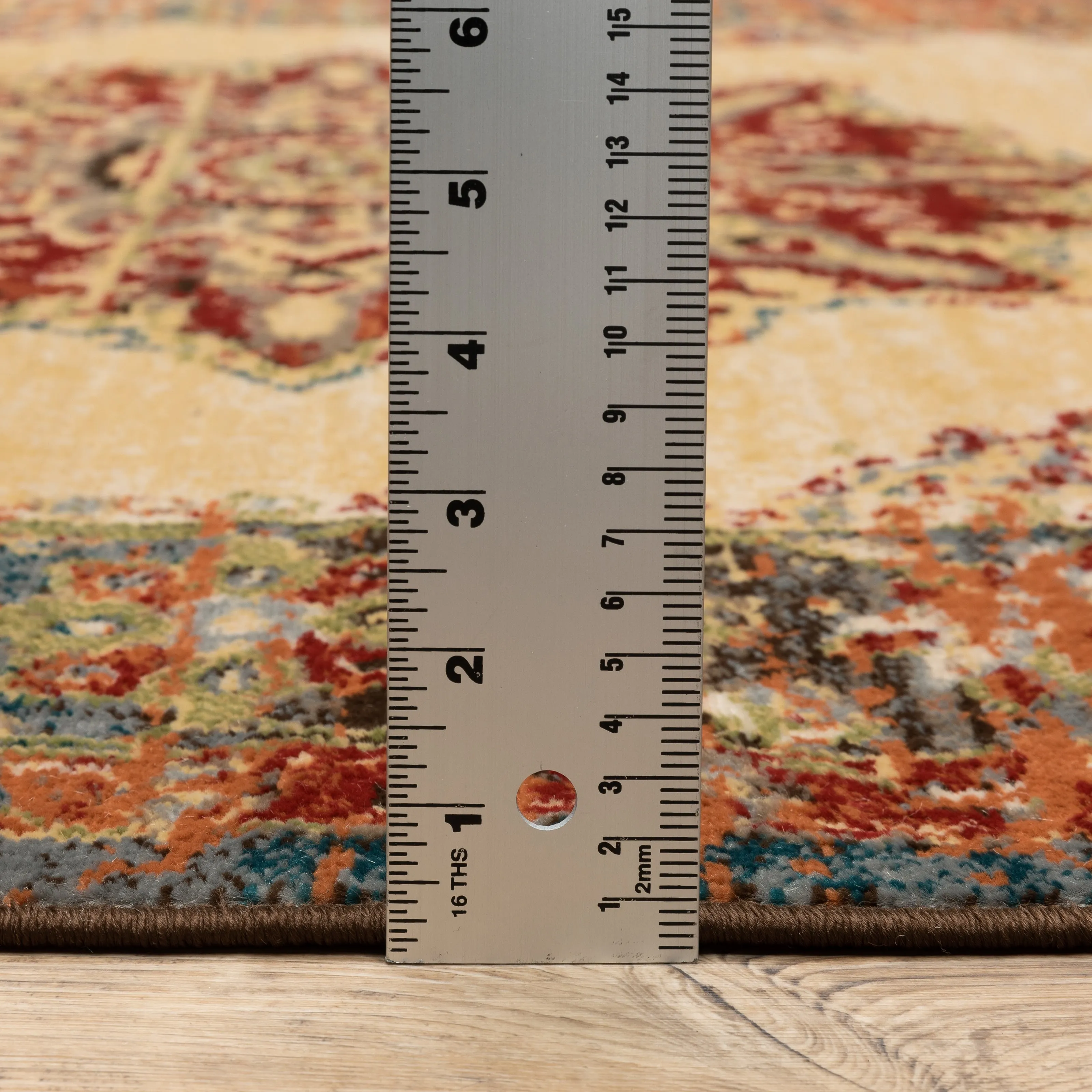 Vista Home Assen Goldtone/Orange Starburst Medallion Area Rug