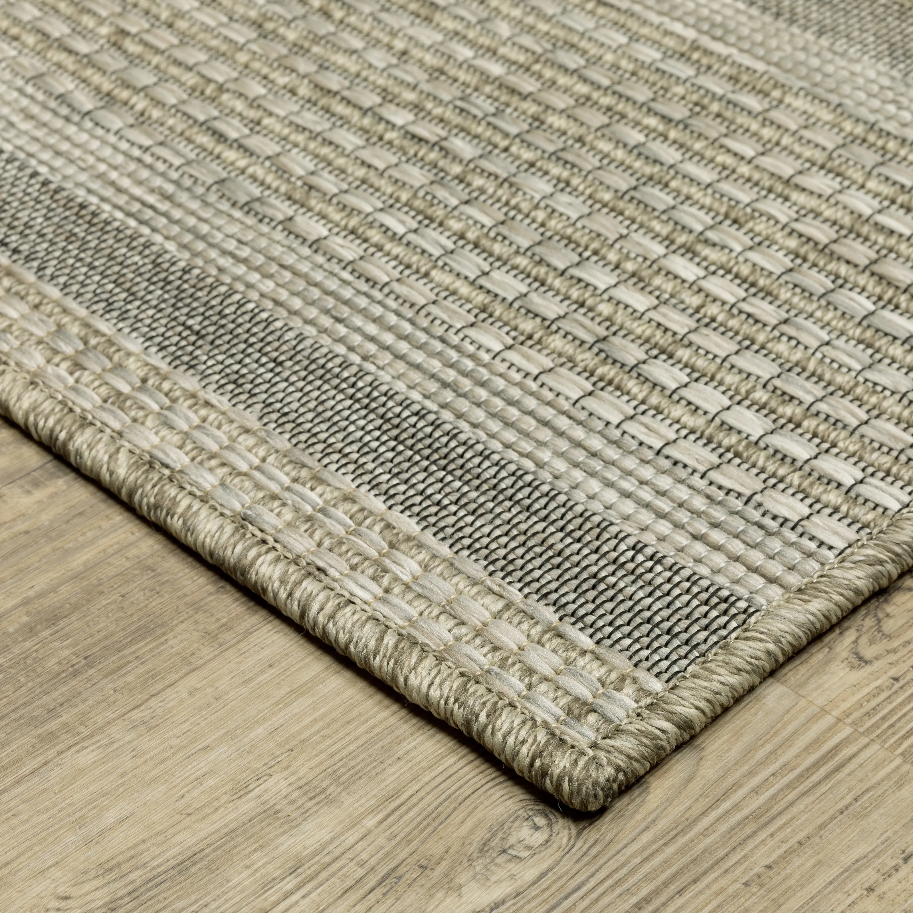 Vista Home Tangelo Banded Border Tan/Black Ultimate Performance Area Rug.